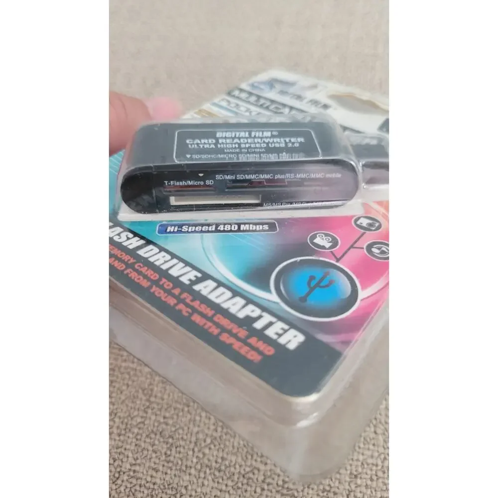 Digital Film Multi-Card Reader/Writer, also described as a USB Flash Drive...